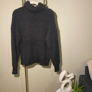 Oversized knitted turtle neck black sweater